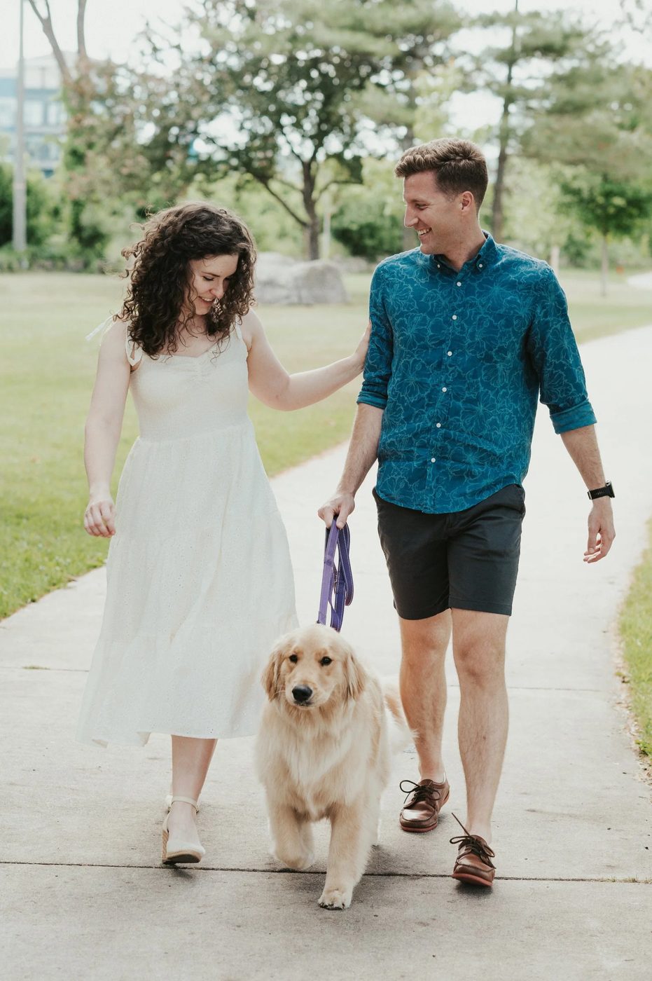 Ben and Ruth walking Opel, their golden retriever
